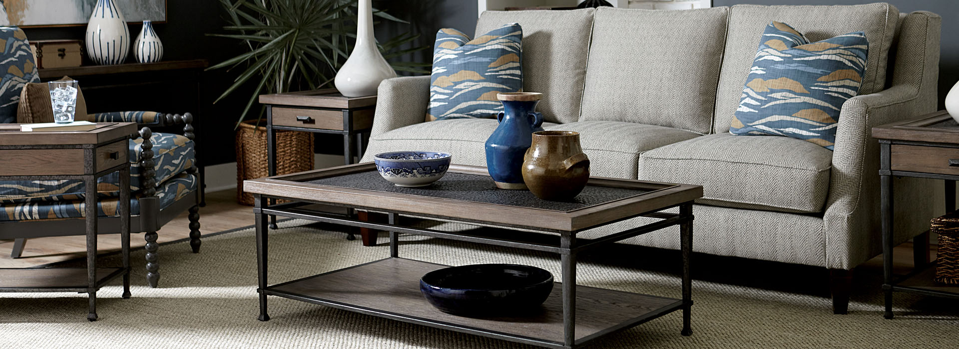 a coffee table with bowls on it